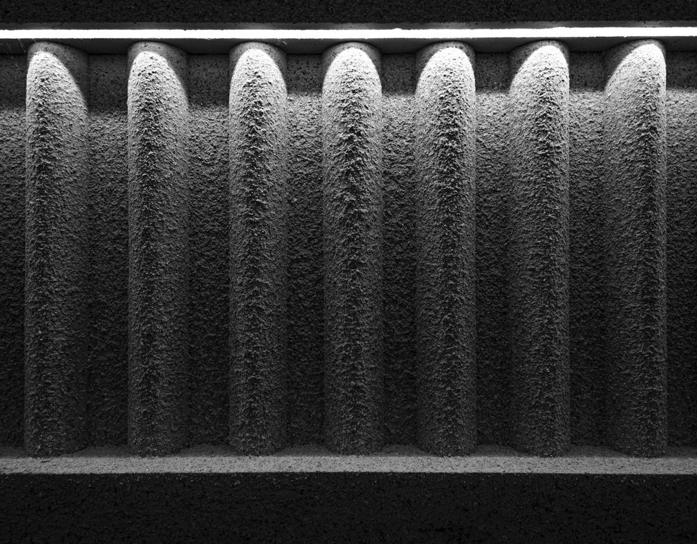 Close-up of a dusty pleated furnace filter